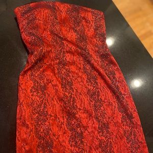 Long tube black tie even dress. Red and black beads.